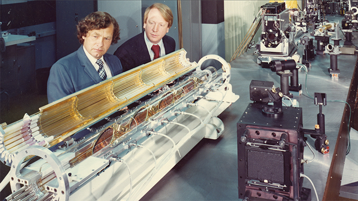 Carl Haussmann and John Emmett working on lasers in 1973