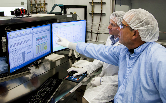 Technicians Monitor the Automated Target Proofing System