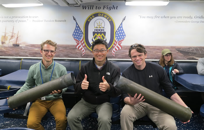 LLNL Researchers Hold Spent Munitions Canisters