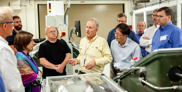 Workshop Attendees Tour Optics Processing Facility