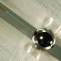 Two-Micron Fill Tube in a Target Capsule