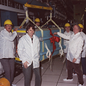 John Emmett, right, leader of LLNL’s first physics program, cuts the ribbon on the Nova laser