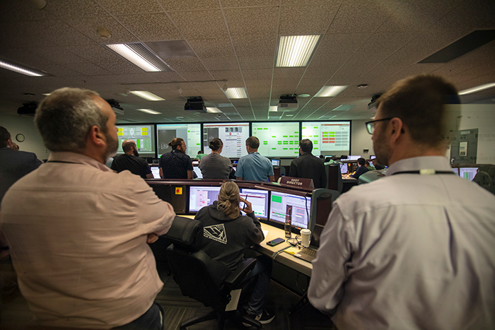 Adam Langro and Steve Weaver demonstrate a shot countdown in the NIF Control Room