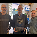 LLNL’s Brian Spears (center) holds the HPCwire Editor’s Choice award for Best Use of HPC in Energy with LLNL computer scientists Peer-Timo Bremer (left) and Brian Van Essen