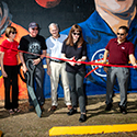 Former NASA astronaut and former LLNL official Tammy Jernigan cuts the ribbon to dedicate ‘Dream Big’ mural