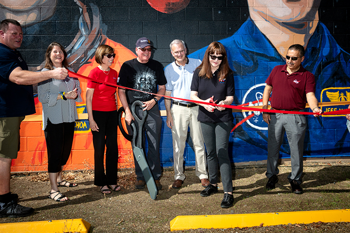 Former NASA astronaut and former LLNL official Tammy Jernigan cuts the ribbon to dedicate the “Dream Big” mural on Sept. 24 in downtown Livermore
