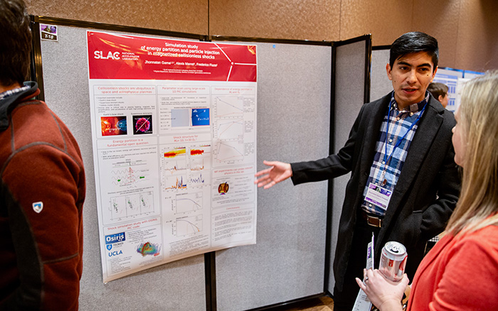 Jhonnatan Gama Vazquez of Stanford University and the SLAC National Accelerator Laboratory, explains his poster