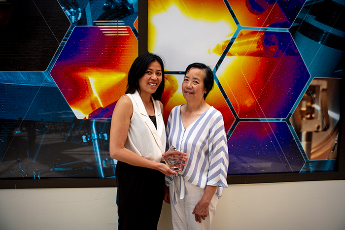 Tammy Ma, left, celebrates her accomplishment with her mother Kim Ma