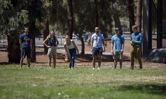 The summer interns enjoy playing bocce ball, one of the lawn games held last summer at LLNL
