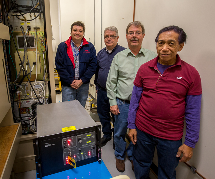 PCS Team Members With High-Voltage Power Supply